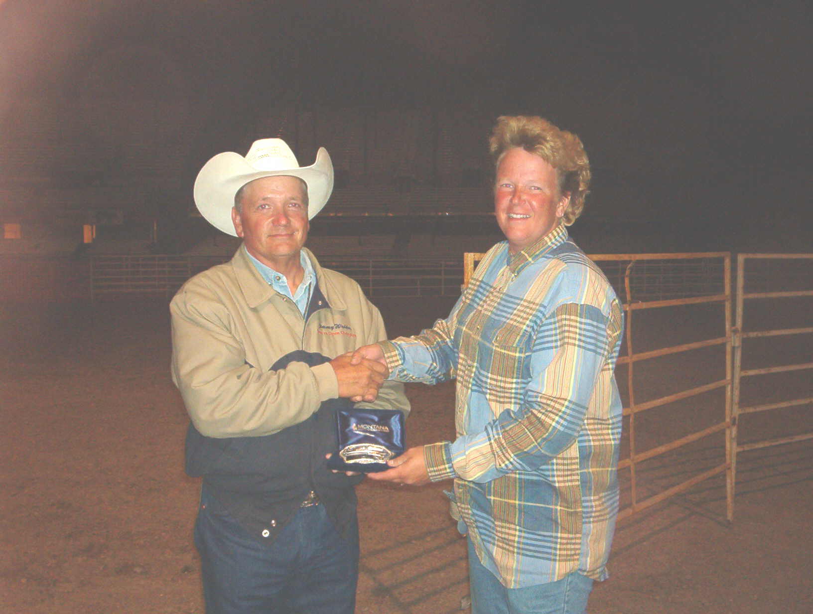 Jimmy Walker receiving the buckle with Bill for winning the Open Sheep at Cheyenne, Wyoming