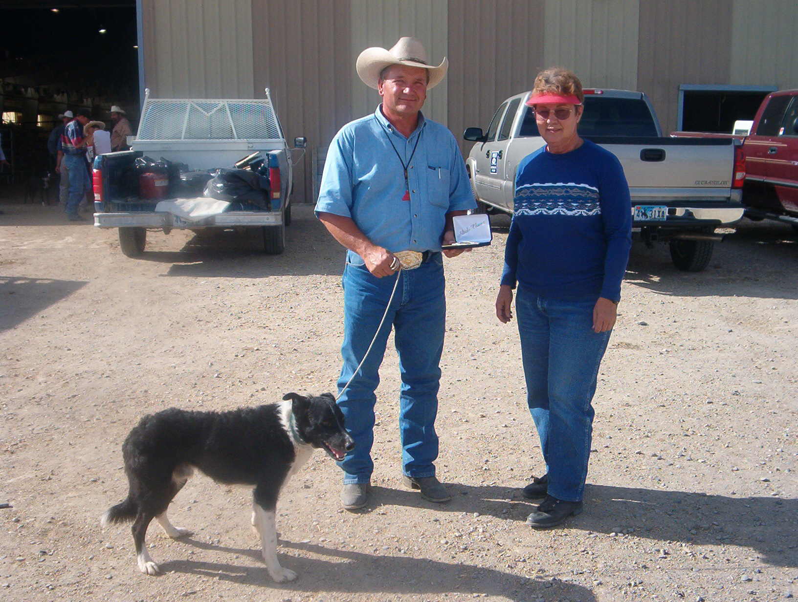 Jimmy Walker receiving the belt buckle and desk pen set with Ben after winning the Open at Rock Springs, Wyoming
