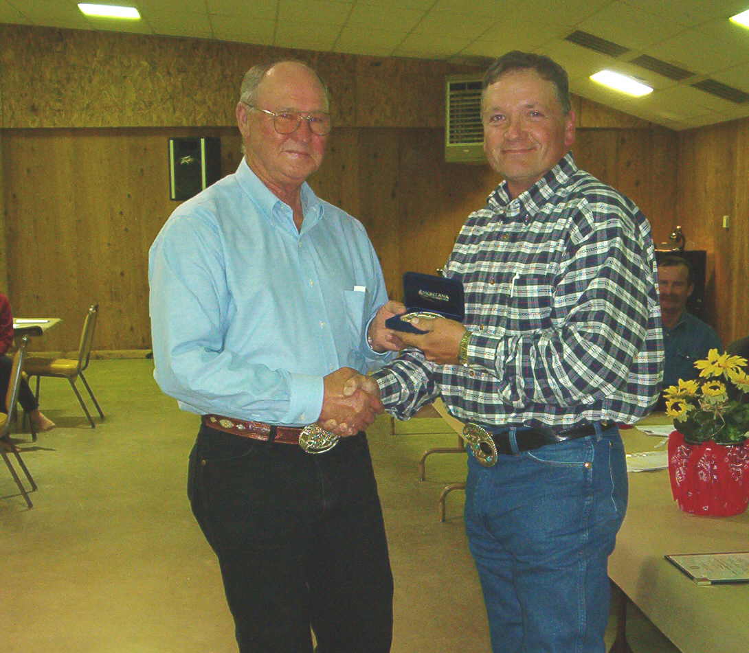 Ben and Jimmy Walker at the 2004 Texas Cattledog Finals after Ben won the Open class